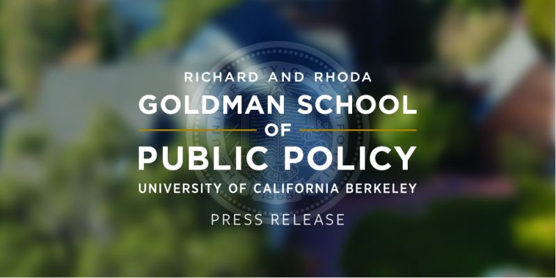 The Goldman School logo is placed upon a blurred image of the Goldman School.