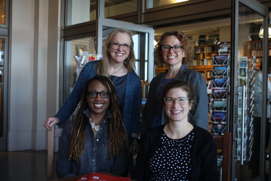 Betsy Baum Block, Corey Newhouse, Justine Wolitzer, and Jamie Allison smile for the camera.